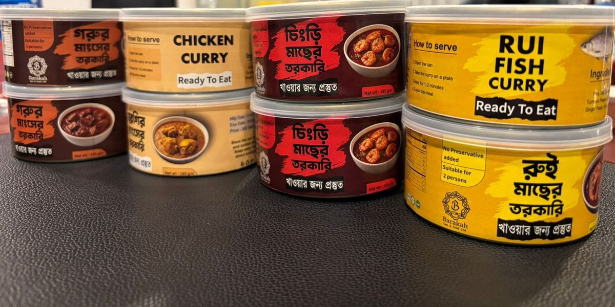 Prime Harvest ready-to-eat curry cans stacked in rows: beef, chicken, shrimp and rui fish.